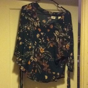 Half length sleeves . Shirt blouse